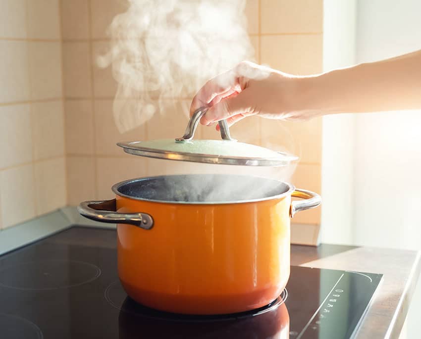 It is also beneficial to have lids on pots that are boiling. The lid keeps the water vapor from escaping into the indoor air